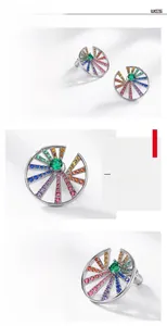 Close-up of S925 silver fan-shaped stud earrings with rainbow zircon and green center stone