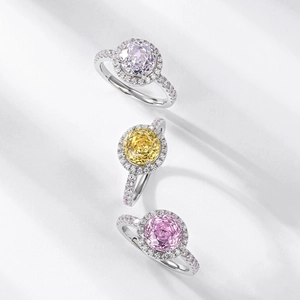 Three S925 silver rings with round halo-set zirconia stones in purple, yellow and pink