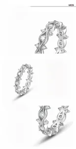 Macro detail of S925 sterling silver band with hand-set moissanite stones and polished finish