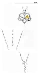 Detail of S925 silver heart necklace with golden rose and I love you forever engraving