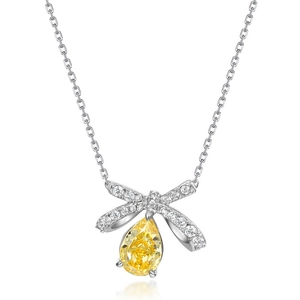 Bowknot silver necklace featuring a pear-cut yellow gemstone pendant on a classic cable chain