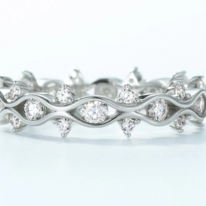 Elegant S925 sterling silver interlocking wave ring with sparkling moissanite stones