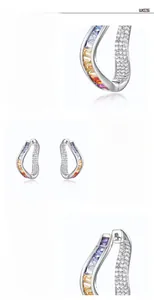 Close-up of J-hoop earrings in S925 silver with colorful cubic zirconia stones