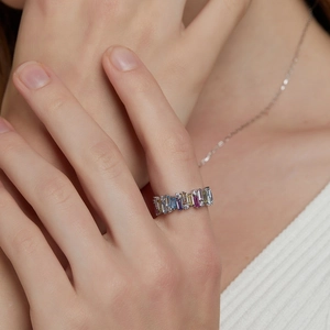 Elegant S925 silver rainbow ring with baguette-cut multicolored gemstones on finger