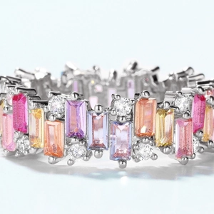 S925 silver eternity ring featuring colorful rectangular cubic zirconia in pave setting