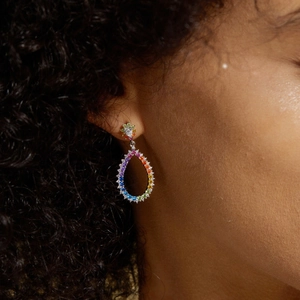 Rainbow gradient drop earrings in S925 silver with colorful cubic zirconia on a model