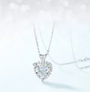 Close-up of heart-shaped carbon diamond pendant with S925 silver halo setting details