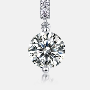 Sparkling Moissanite teardrop earrings in S925 silver with a brilliant round cut pendant
