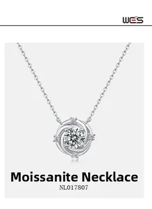 Macro shot of silver moissanite necklace with spiral pendant and brilliant center stone