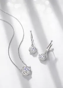Macro shot of S925 sterling silver moissanite jewelry set with necklace and earrings