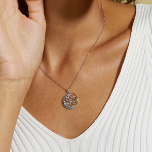 Detailed view of S925 silver necklace with rainbow zirconia and Celtic knot pendant