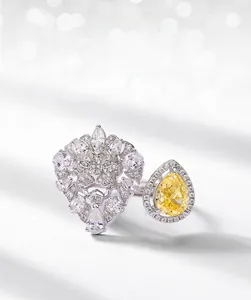 Detail of S925 silver lion head ring with pear-cut yellow carbon diamond and pave stones