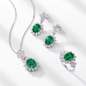 Vintage S925 silver jewelry set with emerald green stones and marquise zircon accents