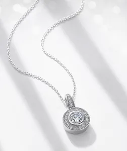 Close-up of a sparkling round moissanite pendant on an S925 sterling silver chain