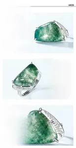 Detailed macro view of S925 silver ring with natural green moss agate and polished finish