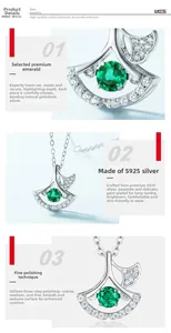 Détail macro du collier feuille de ginkgo en argent S925 avec émeraude et diamants