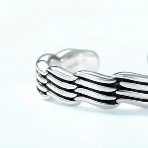Retro S925 silver wave patterned open ring with blackened industrial finish for men and women