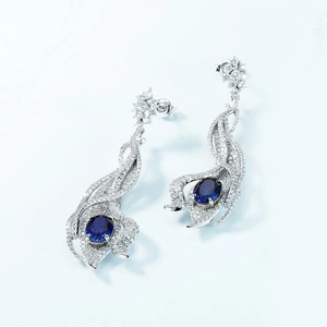 Retro S925 silver hollow leaf drop earrings with oval blue sapphire and pavé cubic zirconia