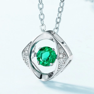 Elegant S925 silver necklace featuring a sparkling green emerald devil eye pendant