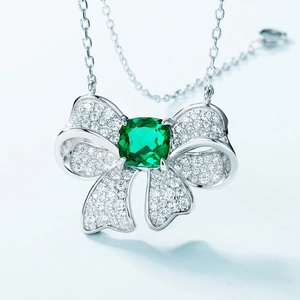 Luxury S925 silver butterfly necklace featuring a square green emerald gemstone pendant