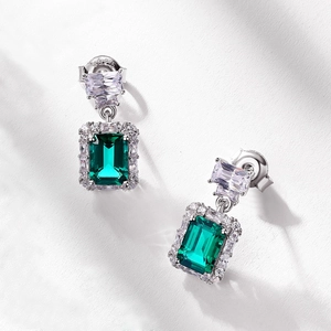 Vintage S925 silver drop earrings with emerald-cut green gemstones and white zircon accents
