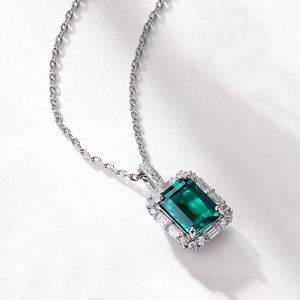 Luxurious S925 silver necklace with emerald cut green gemstone and halo diamonds