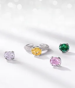 Macro shot of silver DIY ring set with interchangeable multi-color oval cut gemstones