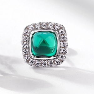 Elegant S925 silver stud earrings featuring sugarloaf cut emerald surrounded by crystals
