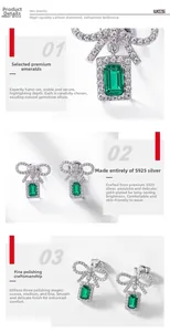 Détail de boucles d'oreilles nœud avec émeraudes et artisanat en argent S925