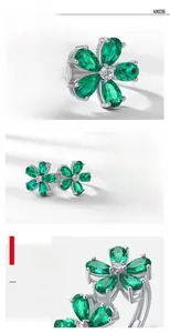 Detailed close-up of S925 silver petal ring with lab-grown emerald and white diamonds