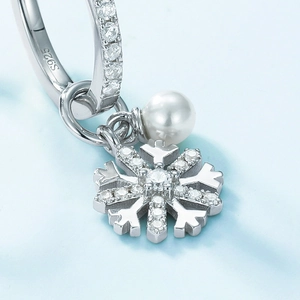 Elegant S925 silver earrings with shell pearl and sparkling cubic zirconia snowflake
