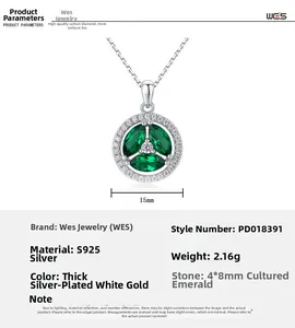 Detail of 15mm S925 silver clover pendant with lab emeralds and small diamonds