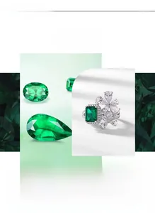 Detail of flower-shaped silver ring featuring emerald-cut green zircon and white petals