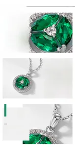 Macro detail of S925 silver emerald clover pendant with brilliant cut cubic zirconia stones