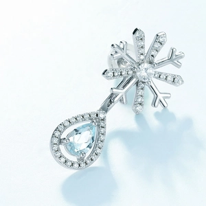 S925 silver snowflake earrings with pear-cut blue topaz drop and brilliant cubic zirconia