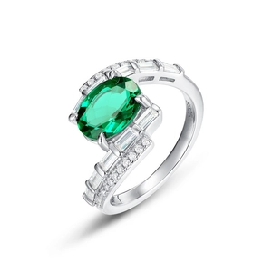 Oval emerald green gemstone S925 silver ring with asymmetrical diamond accents
