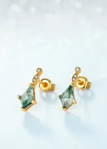 Macro detail showing S925 hallmark on gold-plated moss agate kite-shaped earrings