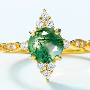 Vintage gold S925 silver ring featuring moss agate and sparkling zircon starburst