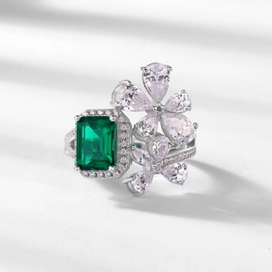 Petal-shaped S925 silver ring with emerald-cut green gemstone and halo diamonds