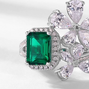Luxurious S925 silver emerald cut green gemstone ring with pink floral petal accents