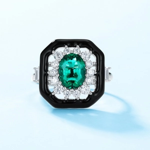 Vintage sun flower ring with oval emerald and black enamel border in 925 silver