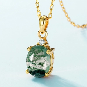 Elegant gold oval moss agate necklace featuring natural green inclusions and fine zircon