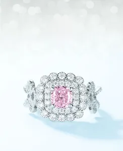 Detail of S925 silver ring with pink ice-cut carbon diamond and double halo setting