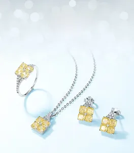 Détail du parure bijoux en pierre jaune taille fleur de glace sur monture argent