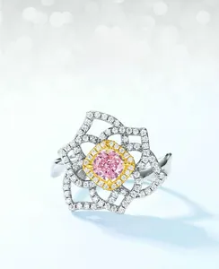 Macro shot of S925 silver flower ring with square pink diamond and micro-pave petals