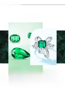 Macro detail of emerald-cut green gem bow ring with pear and oval loose stones