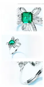 Macro shot of S925 silver ring featuring emerald cut center stone and bow design