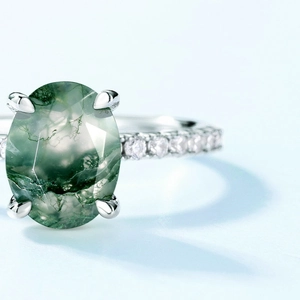 Oval moss agate ring in S925 sterling silver with micro-pave side stones and four-prong setting