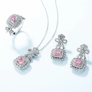 Pink cushion cut S925 silver jewelry set with bow accents and sparkling accents