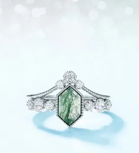Macro view of a hexagonal green moss agate ring set in 925 sterling silver with zircons